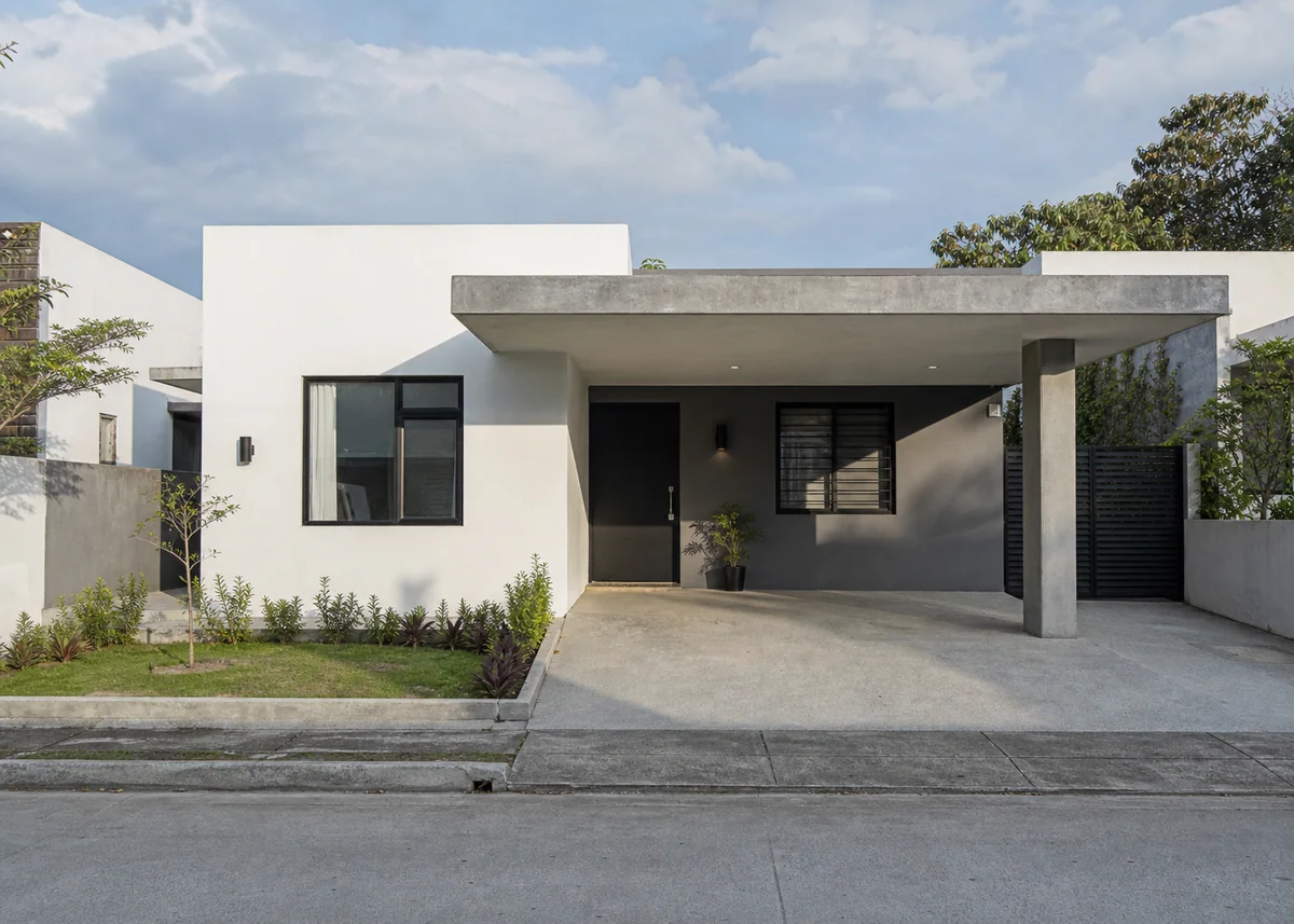 simple house front design: Simple house front with integrated carport and two-tone paint scheme